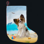 Papillon Dog on Beach Small Christmas Stocking<br><div class="desc">Cute dog sitting on beach is a perfect gift idea for someone who love this dog breed.</div>