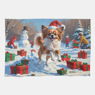 Papillon Dog Running in Snow with Christmas Hat Kitchen Towel