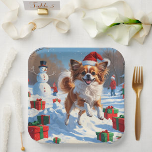 Papillon Dog Running in Snow with Christmas Hat Paper Plate
