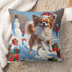 Papillon Dog Running in Snow with Christmas Hat Throw Pillow