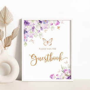 Papillon en or violet signe le livre d'or