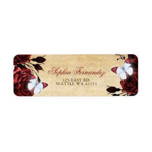 Papillon floral de roses rouges rustiques vintage