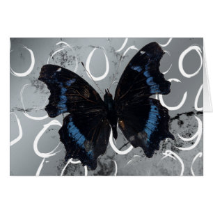 Papillon sur fond argenté avec cercles vides à l'i