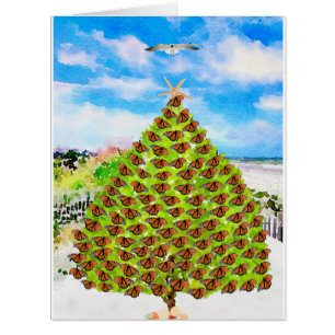 Papillons aquarelles et sapin de Noël à la plage