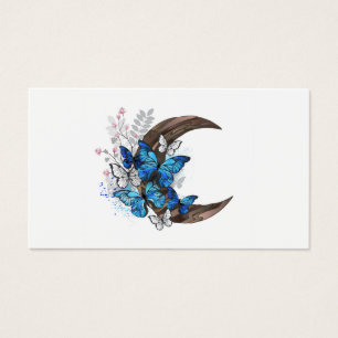 Papillons bleus sur croissant en bois