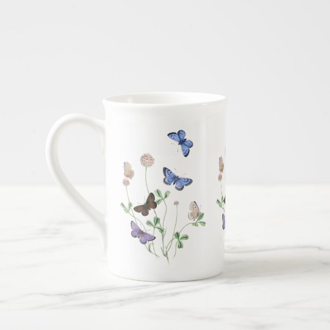 Papillons de tasse de porcelaine tendre de la (Gauche)