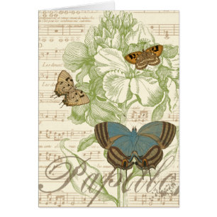 Papillons sur la musique de feuille avec la