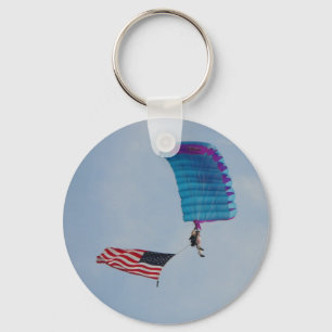 parachuting thew the clear blue sky keychain