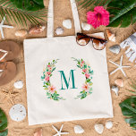 Paradise Floral Monogram Tote Bag<br><div class="desc">Custom wedding bridal party tote bags personalized with your monogram initial or other custom text. This elegant feminine design has a watercolor floral wreath tropical flowers and greenery. Use the design tools to personalize each monogram, choose any background colour, edit text fonts and colours and add photos to create a...</div>