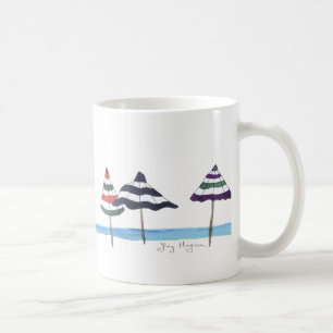 Parapluies sur les tasses et le Drinkware de plage