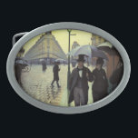 Paris Street Rainy Day by Gustave Caillebotte Oval Belt Buckle<br><div class="desc">Paris Street, Rainy Day (aka Paris: A Rainy Day) (1877) by Gustave Caillebotte is a vintage impressionism fine art urban cityscape painting. A cobblestone street intersection near the Gare Saint-Lazare, a railroad train station in north Paris, France. People are walking in the rain holding umbrellas in the city. About the...</div>