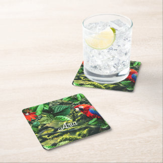 Parrot scarlet macaw in jungle with flowers square paper coaster
