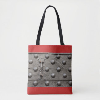 particular of the door of a castle  tote bag