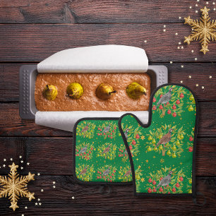 Partridges, pear trees, and snowflakes green oven mitt & pot holder set