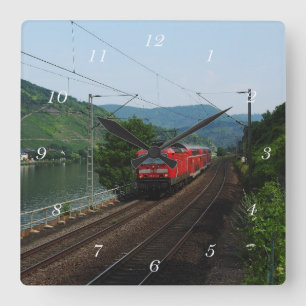 Passenger train in St. Aldegund Square Wall Clock