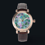 Pastel colors stained glass mosaic pattern watch<br><div class="desc">Elevate your accessories with our stunning watch design,  showcasing a unique pastel-colored stained glass mosaic pattern and elegant black Roman numerals.</div>