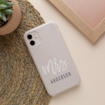 Pastel Dusty Blush Pink New Mrs Last Name Bride iPhone 16 Case<br><div class="desc">After the wedding, show off your new last name with this sleek and stylish case -- perfect for the honeymoon! Personalized bride design features "Mrs. [lastname]" in modern white and grey typography on a subtle pastel dusty blush pink background. Use the field provided to personalize with your new last name....</div>