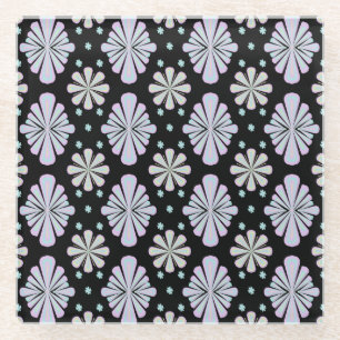 Pastel floral shapes on a black background glass coaster