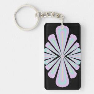 Pastel floral shapes on a black background keychain