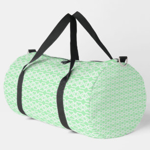 Pastel green with white fencing pattern on duffle bag