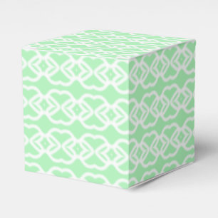 Pastel green with white fencing pattern on favor box