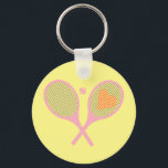 Pastel Heart Tennis Player Racquets Ball Design    Keychain<br><div class="desc">Classic and elegant, preppy pink Tennis Rackets with heart For Her | Summer Tennis Court. Gift for tennis player, pink racquet tennis match on a pastel light yellow background. Personalized Gift for a tennis player. Trendy tennis players home decor. Trendy modern tennis player gifts. Cool retro modern gift for your...</div>