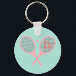 Pastel Heart Tennis Player Racquets Ball Design   Keychain<br><div class="desc">Classic and elegant, preppy pink Tennis Rackets with heart For Her | Summer Tennis Court. Gift for tennis player, pink racquet tennis match on a pastel light blue background. Personalized Gift for a tennis player. Trendy tennis players home decor. Trendy modern tennis player gifts. Cool retro modern gift for your...</div>