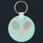 Pastel Heart Tennis Player Racquets Ball Design   Keychain<br><div class="desc">Classic and elegant, preppy pink Tennis Rackets with heart For Her | Summer Tennis Court. Gift for tennis player, pink racquet tennis match on a pastel light blue background. Personalized Gift for a tennis player. Trendy tennis players home decor. Trendy modern tennis player gifts. Cool retro modern gift for your...</div>