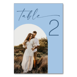 Pastel Sky Blue Minimalist Wedding | Arch Photo Table Number