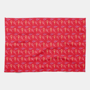Pastel Tennis Rackets with Tennis Ball on Red Kitchen Towel