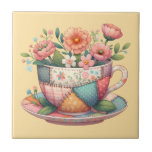 Patchwork Teacup with Whimsical Flowers Tile<br><div class="desc">A charming fusion of cozy cottagecore and nostalgic patchwork, this design features a teacup bursting with whimsical florals in soft, pastel hues. Each panel of the teacup is adorned with vintage-inspired fabric patterns—plaids, florals, and polka dots—stitched together with visible seams for a handmade, quilt-like look. The surrounding flowers bloom in...</div>