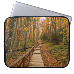 Path through the autumn forest. laptop sleeve