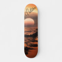 patineta con la puesta del mar