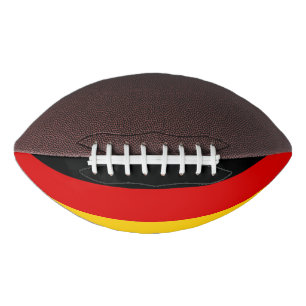 Patriotic american football with flag of Germany