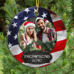 Patriotic USA American Flag Personalized 2 Photo Ceramic Ornament<br><div class="desc">USA American Flag Christmas Ornament. This patriotic stars and stripes usa flag christmas ornament will be a treasured keepsake. Ornament is double sided, you can do 2 favorite photos, one on each side. Perfect for military, soldier Christmas ornament, military veteran, patriotic family.. Personalize name on the front, and date on...</div>