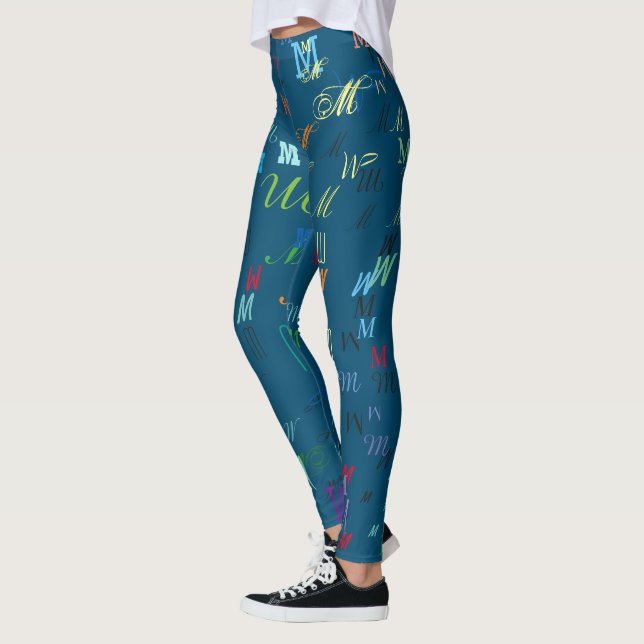 Pattern of colourful initials personalized on blue leggings (Left)
