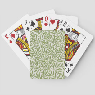 Pattern of green leafy branches playing cards