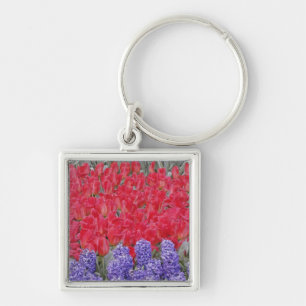 Pattern of hyacinth, tulips, and daffodils, keychain