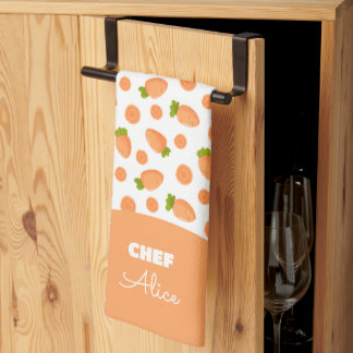 Pattern of small carrots and slices kitchen towel
