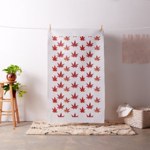 Pattern of the falling leaves on black fabric