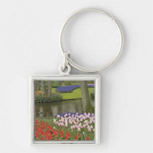 Pattern of tulips and grape hyacinth flowers, keychain