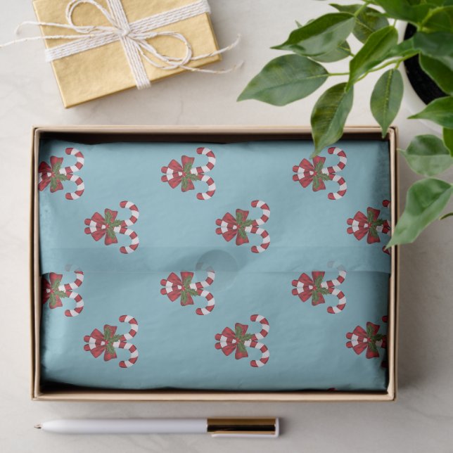 Pattern Of Two Red And White Candy Canes On Blue Tissue Paper (Gift)