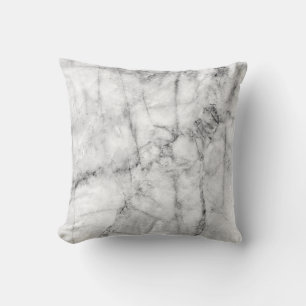 Pattern on the white marble floor texture and back throw pillow