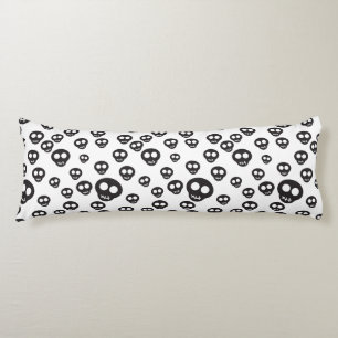 Pattern with black skulls on white body pillow