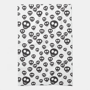 Pattern with black skulls on white kitchen towel