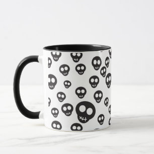 Pattern with black skulls on white mug