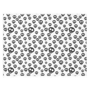 Pattern with black skulls on white tablecloth
