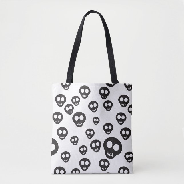 Pattern with black skulls on white tote bag (Front)