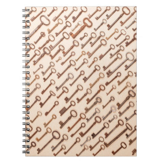 Pattern with real vintage victorian keys on kraft  notebook