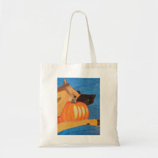 Pattes de chien et sac à citrouille